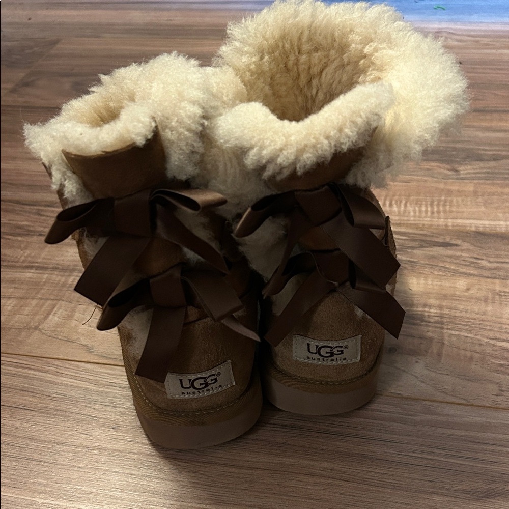 UGG Tan Sheepskin Boots with Brown Bows